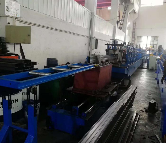 Rack system box beam roll forming machine